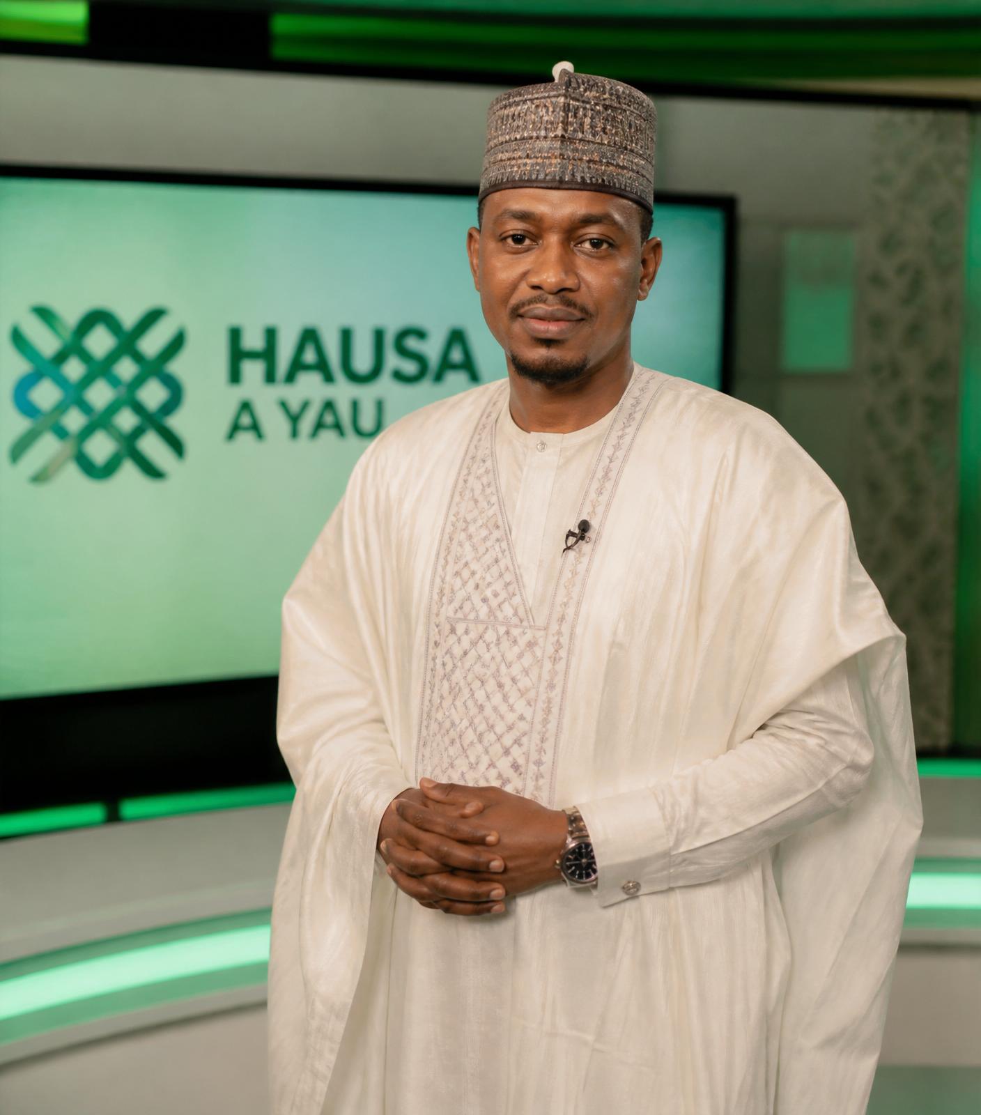 Mahanga TV presenter in a modern broadcast studio